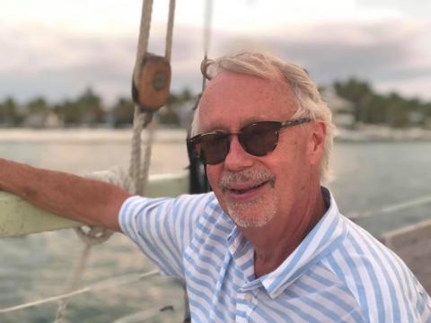 Earl Johnson aboard a boat while cruising the waters near Fripp Island, South Carolina.  