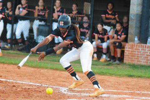 Jakalah Allen slaps the ball in the loss to Stephens County on Sept. 13. 