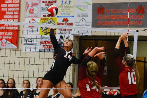 Dakota Phillips goes for the kill against North Oconee on Sept. 8.