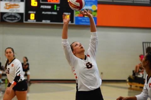Jazania Shealer makes contact in the team’s home game on Thursday, Aug. 25.