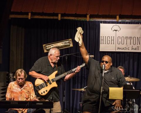 Marshall Walker, pictured above, doing what he loves most: playing bass with “Big C” at High Cotton Music Hall Blues Jam. 