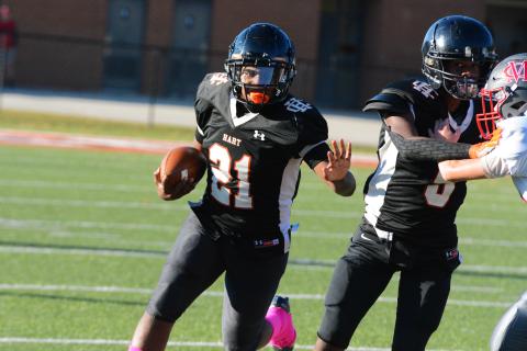 Faustino Rangel runs the ball on the first play of the game against Madison County on Thursday, Oct. 13.