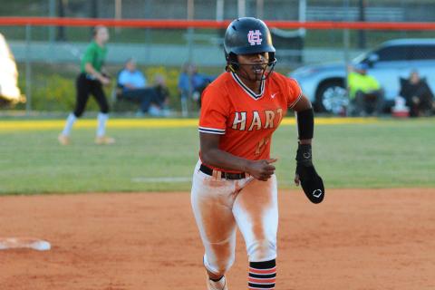 Jazania Shealer runs to third in the final home game of the season. 