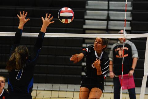 Lillie Rogers goes for the kill in the loss to Oconee County on Oct. 4. 