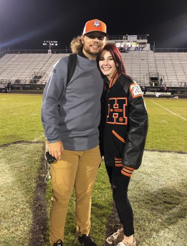My wife Madison and I after the 2019 home game against Monroe Area.