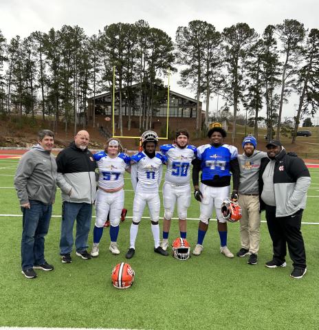 From left to right: Hart County head football coach Cory Dickerson, offensive coordinator Roger Gentry, offensive lineman Nick Carlson, defensive back Keith Curry, offensive lineman Logan Beard, defensive lineman Derrick Clarke, quarterbacks coach Caleb Sorrells, and defensive coach Don McCord at the FCA All-Star game on Dec. 17.