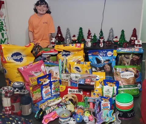 After requesting supplies for the Northeast Georgia Animal Shelter as ninth birthday gifts, Asher Lack donates a haul of items. 