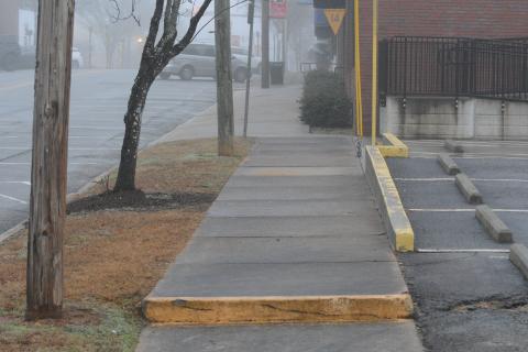 The sidewalk along South Forest Street in Hartwell. The city is expected to begin phasing in sidewalk projects near the public schools initially. 