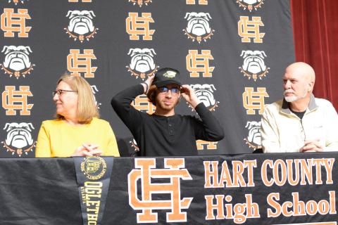 Pictured left to right: Leard’s mother, Karen, senior tennis player Daniel, and his father, Tim, as Daniel commits to Oglethorpe on National Signing Day.