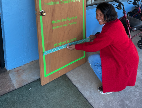 Shamrika Johnson crossing out her first tier at the Hart County Habitat for Humanity Restore headquarters at 900 Benson Street.