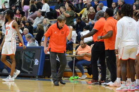 Dogs head coach Matt Gibbs fired up after taking down Hebron Christian, 47-43 in the consolation game on Feb. 17 to earn the three seed in the Georgia High School basketball state tournament.