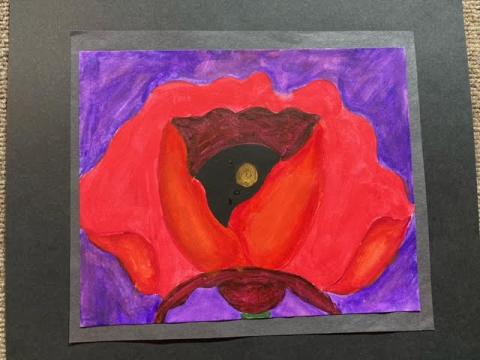 The “Our Artful Youth” exhibit includes piece Susan Sanchez. Sanchez, an eighth grader in April Garner’s class, titled her acrylic piece “Remembrance Poppy.”
