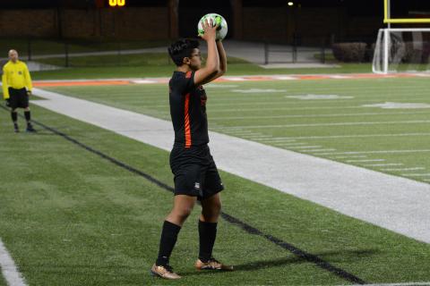 Pictured is junior defender Fabian Rodriguez Escobedo looking down the line on a throw in.