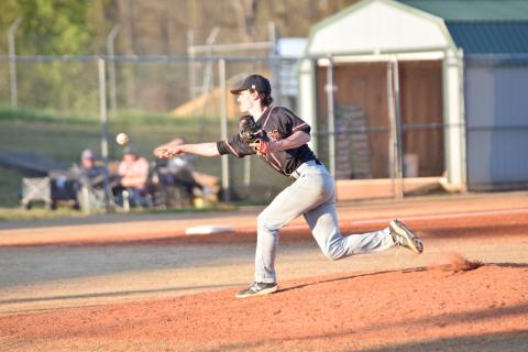 Senior relief pitcher Jordan Leach delivers a fastball in the 16-8 loss in game one of the double header at Franklin on March 23. The Diamond Dogs also lost game two of the double header by a score of 13-10 and were swept by the Lions.