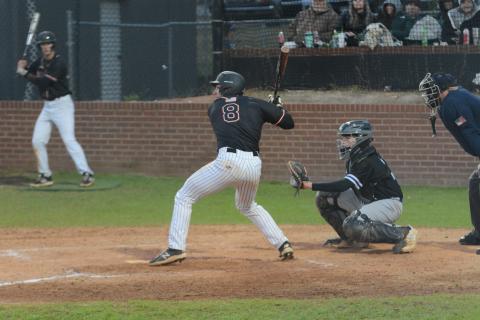 Pictured is senior catcher Riley Posey as he picked up an RBI single in the sixth inning to propel the Dogs to a 10-5 win over Oconee County on Tuesday.