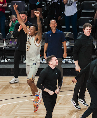 Pictured left is Shone Webb with Ben Edwards pictured right celebrating after Emmanuel College wins the Conference of Carolinas championship on Sunday.