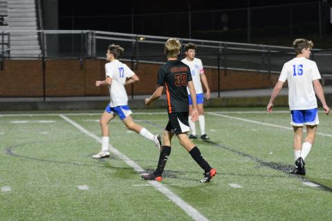 Freshman forward William Bell (33) puts multiple shots on goal in the 7-1 home loss to Oconee County to begin region play.