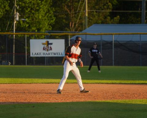 Freshman first baseman Coleman Moore leads off at second base against Oconee County during the 2023 season. (Photo by Lexie Wheless)