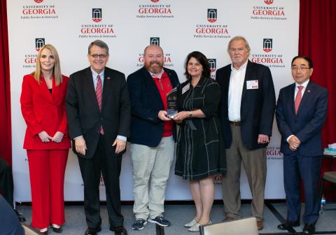 Hart Archway executive committee members Bill Leard and Jason Ford accepted the platinum designation for Hart County becoming a Connected Resilient Community during UGA’s awards week. Pictured from left to right are Jennifer Frum, UGA Vice President for Public Service and Outreach; Jere Morehead, UGA President; Jason Ford, Hartwell Economic and Community Development Director; Michelle Elliott, Archway Partnership Director; Bill Leard, Hart County Archway Partnership Executive Committee Chairman; S. Jack Hu,