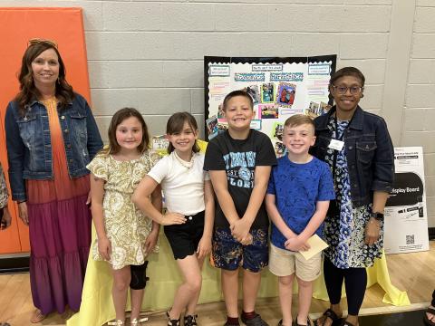 Third graders at North Hart Elementary showcased their economic marketplace at this year’s STEAM Showcase. Pictured are (L-R) Jamie Roberts, Lailan Carter, London Reagin, Brayden Shankle, Harrison Carter and Debbie Hughes. 