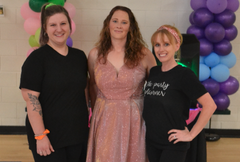 Pictured during the ‘Pumped Up Kicks’ dance and shoe drive at North Hart Elementary School are event planners and organizers (L-R) Jessica Caparas, Elizabeth Rossi and Amber Palmer. The event gave dozens of shoes to local kids. 