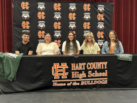 Pictured from left to right is Tyler Trujillo, Kelly Trujillo, Sofia Trujillo (signee), Coach Mollie Payne, and Ashley Risner. 