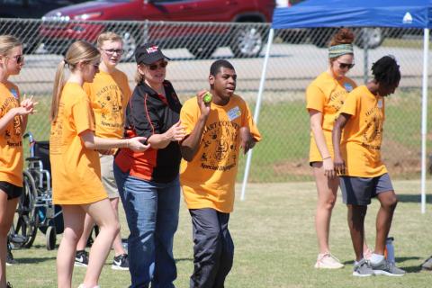Pictured are athletes and volunteers at the 2023 Hart County Special Olympics on April 21. Pictured at the top is Addison Krause, Lyra Osborne, Hudson Milner, Noelle Reese, J’Shawn Jones, Ella Lake Carter, and Azaria Hickman helping in the shot put event.
