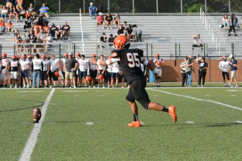 Rising senior kicker Axsel Fajardo gets ready to boot the ball away to kickoff the 2023 spring game versus Habersham Central on Friday, May 19.
