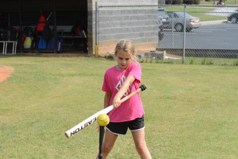Chaylei Carter works on her swing during the 2023 HCHS softball camp on June 5-6.