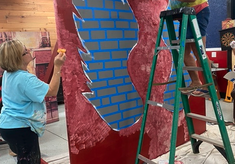 April Garner and Pat Harper are just two members of the Hartwell Service League who have been hard at work preparing a new mural that will be displayed during this year’s Pre-4th Festival.