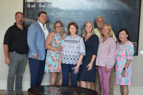 Pictured are (L-R) Ken Lystiuk, Jon Herschell, Leann Long, Elaine Heaton, Candace Jordan, Dennis White, Sue Poole and Harriet Hodgkin. 