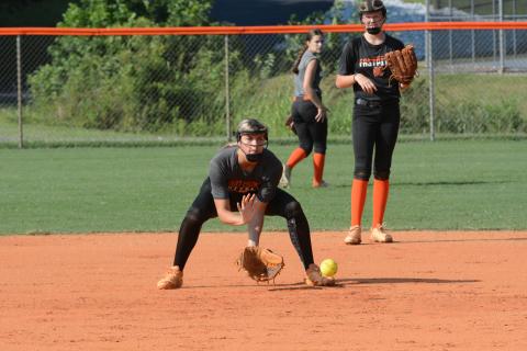 Sophomore infielder Madi Bennett grounds a hard hit ball to second base during a summer practice as the Lady Dogs prepare for their season opener on August 5 at Gainesville.