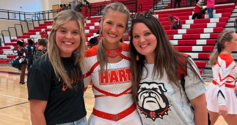 Pictured left from left to right is Hart County’s competition cheer head coach Mollie Payne, Amelia Johnson, and assistant coach Ashley Risner.