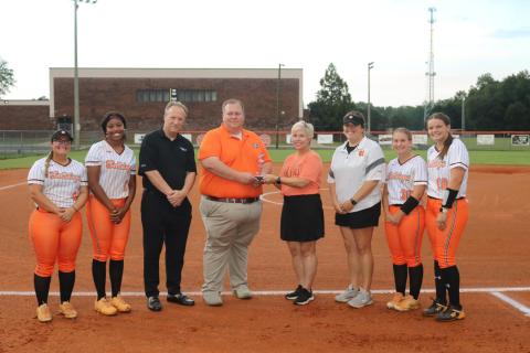The GHSA Spirit Sportsmanship Award was presented before the Aug. 24 Lady Bulldogs softball game against Washington Wilkes. From left is Alexis Davis, Jazz Shealer, Georgia Public Broadcasting’s Jon Nelson, Hart County High School principal Kevin Gaines, Hart EMC’s Angie Brown, Lady Dogs head coach Katie Jo Gentry, Allie O’Bannon, and Gracie Cook.
