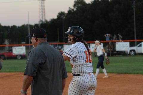 Senior infielder Gracie Cook smiles after driving home an insurance run in the sixth inning to take down the Lady Blue Devils, and avenge thier 12-3 road loss to Elbert County from the week prior, 6-3 Aug. 17.