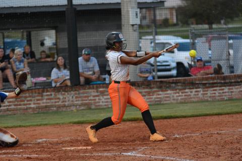 Senior infielder Jazz Shealer makes contact with the ball and picks up a hit against the Lady Tigers of Washington-Wilkes Aug. 24 in the 11-1 loss.
