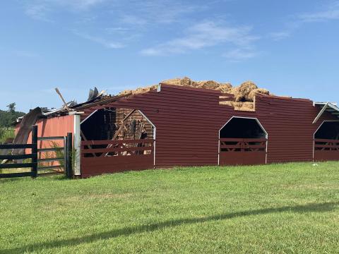A straight-line wind event did severe damage on Saturday evening along Highway 77. The storm ripped the roof off of the Hicks family barn and destroyed a large number of trees. 