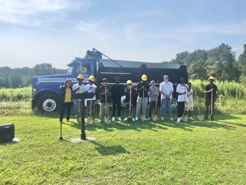 Pictured from left is Sarah LeCroy, Administrator, Nahom Haile (Ethopia), Amanuel Haile (Ethiopia), Yu Deng (Japan), Chris Hajabakiga (Rawanda), Oune Hijazeen (Jordan), Yosilas Feyisa (Ethopia), Jimin Chun (South Korea), Coach Steve Lux, Eli Hajabakiga (Rwanda), and Nolawi Gulti (Ethiopia).