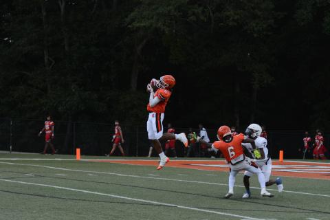 Senior quarterback and cornerback Jashon Gaines makes an interception against Powdersville.