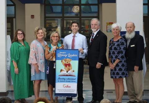 State School Superintendent Richard Woods, pictured third from right, presented North Hart Elementary School with a Literacy Leader banner on September 19, 2023. Pictured, from left to right, are Hart County Board of Education Chair Kim Pierce, Hart County Superintendent Jennifer Carter, NHES Principal Christina Weir, NHES Assistant Principal Marion Hanahan, State School Superintendent Richard Woods, Hart County Board of Education member Henley Cleary, and Hart County Board of Education member Dennis Dowell