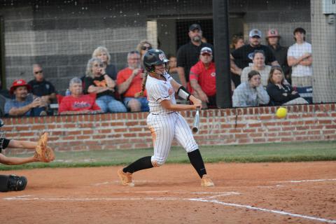 Senior outfielder Allie O’Bannon collects a hit in the 5-4 home loss to the Lady Indians of Stephens County Sept. 28.