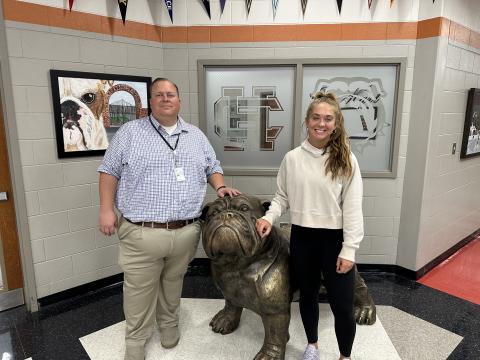 Hart County High School senior Dakota Phillips, pictured right, poses for a photo with Principal Kevin Gaines, left, after receiving news that she was selected to serve on the State School Superintendent’s Advisory Council.