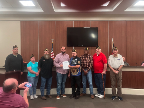 Commander James Fulghum and the men and women from American Legion Post 109 accept a Veteran’s Day proclamation from Hartwell mayor Brandon Johnson. 