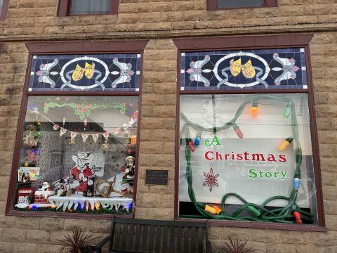 The HCCT gets its windows decorated for the upcoming production of A Christmas Story premiering Dec. 8 