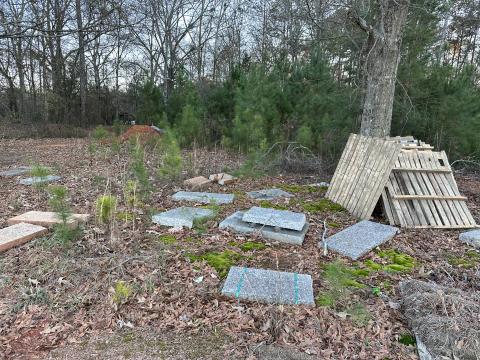 Pieces of blank gravestones litter Nancy Hart Memorial Park