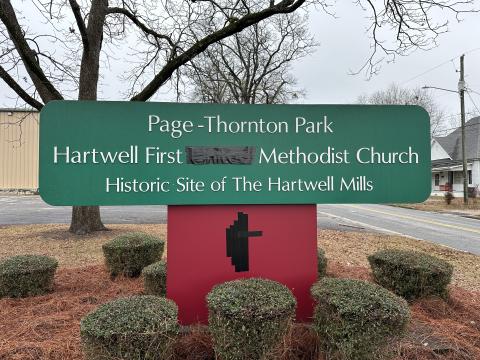 Signage at Hartwell’s First Methodist Church reflects the congregation’s disaffiliation with the United Methodist Church