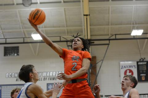 Junior guard O’Brian Evans dropped 13 points in the Dogs 64-56 road win against the Warriors of Oconee County.