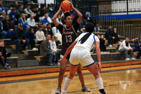 Senior forward Alexis Walker looks to pass the ball to an open teammate in the 44-31 road loss against Oconee County.