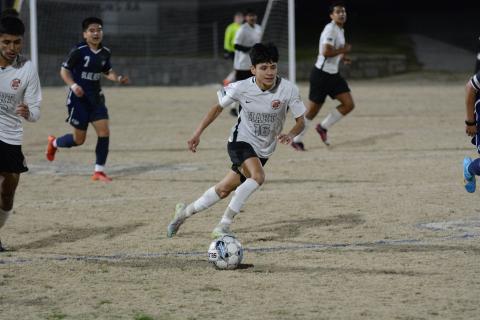 Pictured is senior midfielder Luis Genchi as he scored the lone goal for the Dogs in the 9-1 loss against Elbert County on Feb. 9