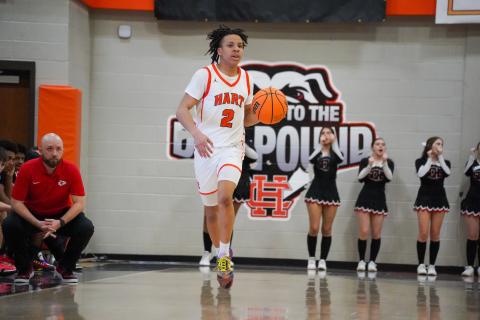 Junior guard O’Brian Evans takes the ball up the court as he was the teams second leading scorer with 13 points in the 66-64 home loss to the Indians of Stephens County on Feb. 2.